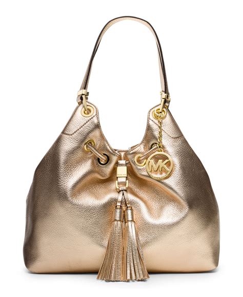 michael kors gold drawstring bag|Michael Kors large tote black.